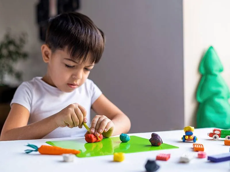 develop-cognitive-and-social-skills-by-hands-on-activities-and-play-based-learning-at-day-care