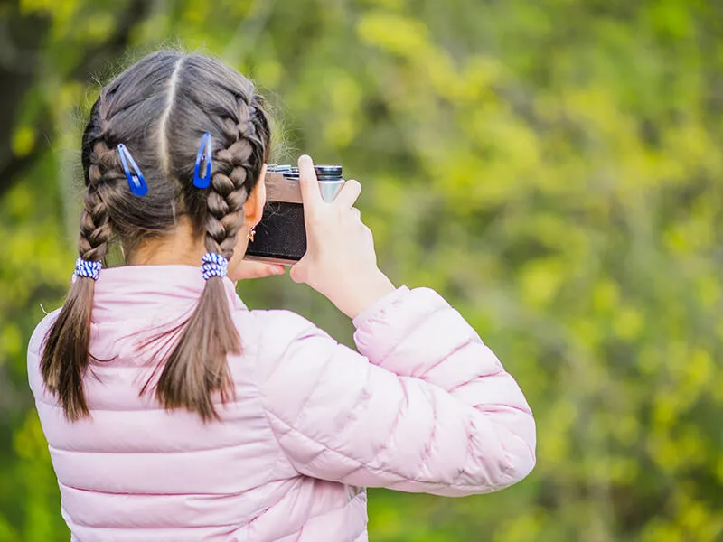 Handing-over-a-camera-to-your-child